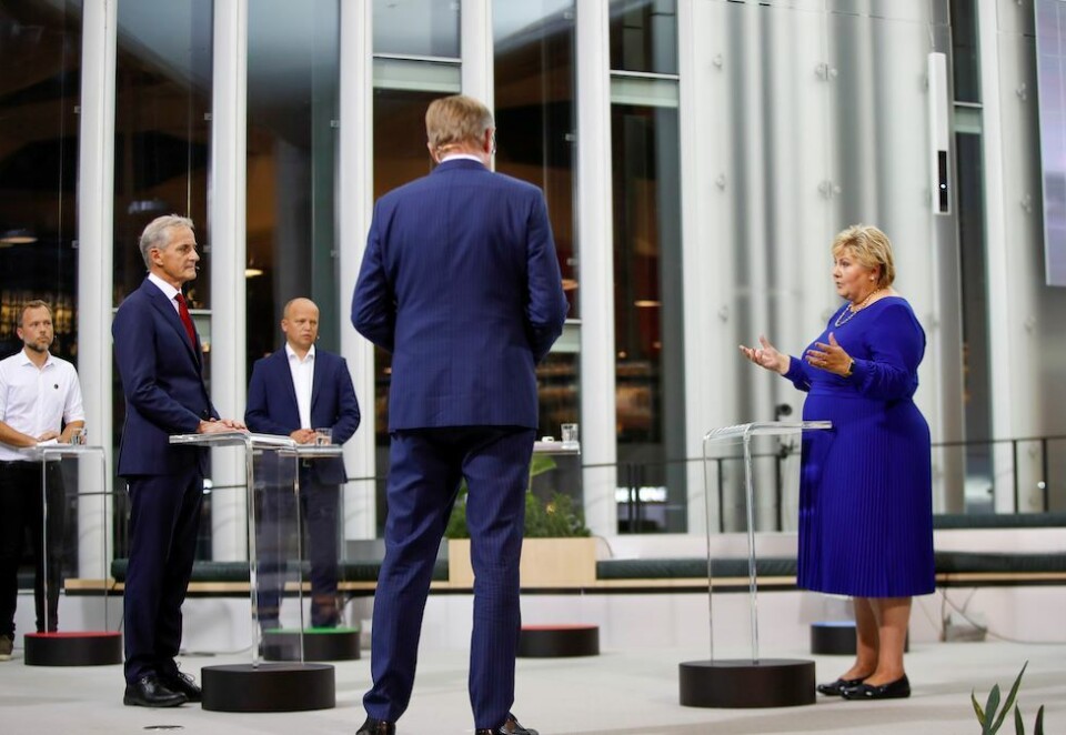 Nest siste debatt: Partilederne Audun Lysbakken (SV), Jonas Gahr Støre (Ap) , Trygve Slagsvold Vedum (Sp) og statsminister Erna Solberg under TV2s partilederdebatt på Deichman Bjørvika onsdag kveld. Programleder Arill Riise med ryggen til. Foto: Javad Parsa/NTB