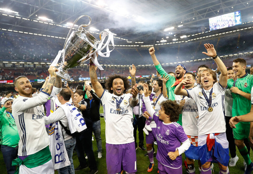 Real Madrid vant fjorårets finale i Champions League og skal forsvare tittelen på ny i kveld mot Liverpool. Samtidig pågår det et finaleoppgjør på den norske mediescenen når Telenor og TV 2 skal gjøre opp om flere hundre tv-millioner kroner. Foto: Scanpix.