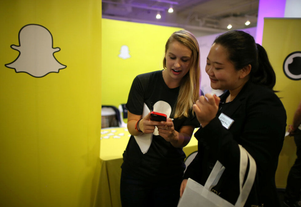Satser i Norge: Snapchat er et av Norges mest brukte sosiale medier, men reklamesalget har ikke vært mye å skryte av. I fjor ansatte Snap Inc. sin første norske salgssjef og nå skyter også omsetningen fart. Bildet er fra en teknologimesse i Los Angeles i fjor. Foto: Reuters/Lucy Nicholson