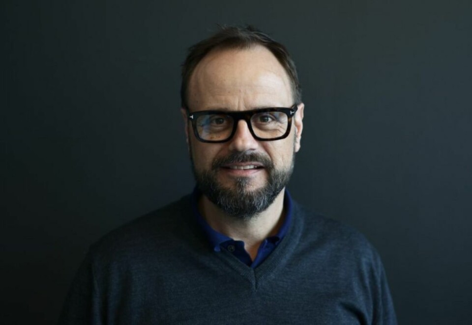 Styrke: Merkevaresjef Cato Geertsen sier det er naturlig at appikonet endres til Postens logosymbol. - Denne soliditeten er selve grunnfjellet i vår merkevarestyrke. Foto: Posten Bring/ Oscar Røykenes